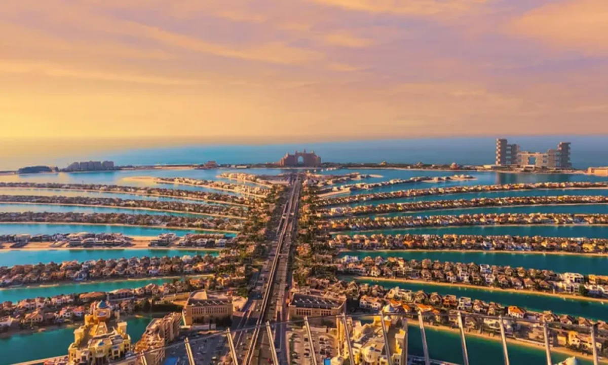 Aerial view of Palm Jumeirah at sunset, calm water, beautiful scenery