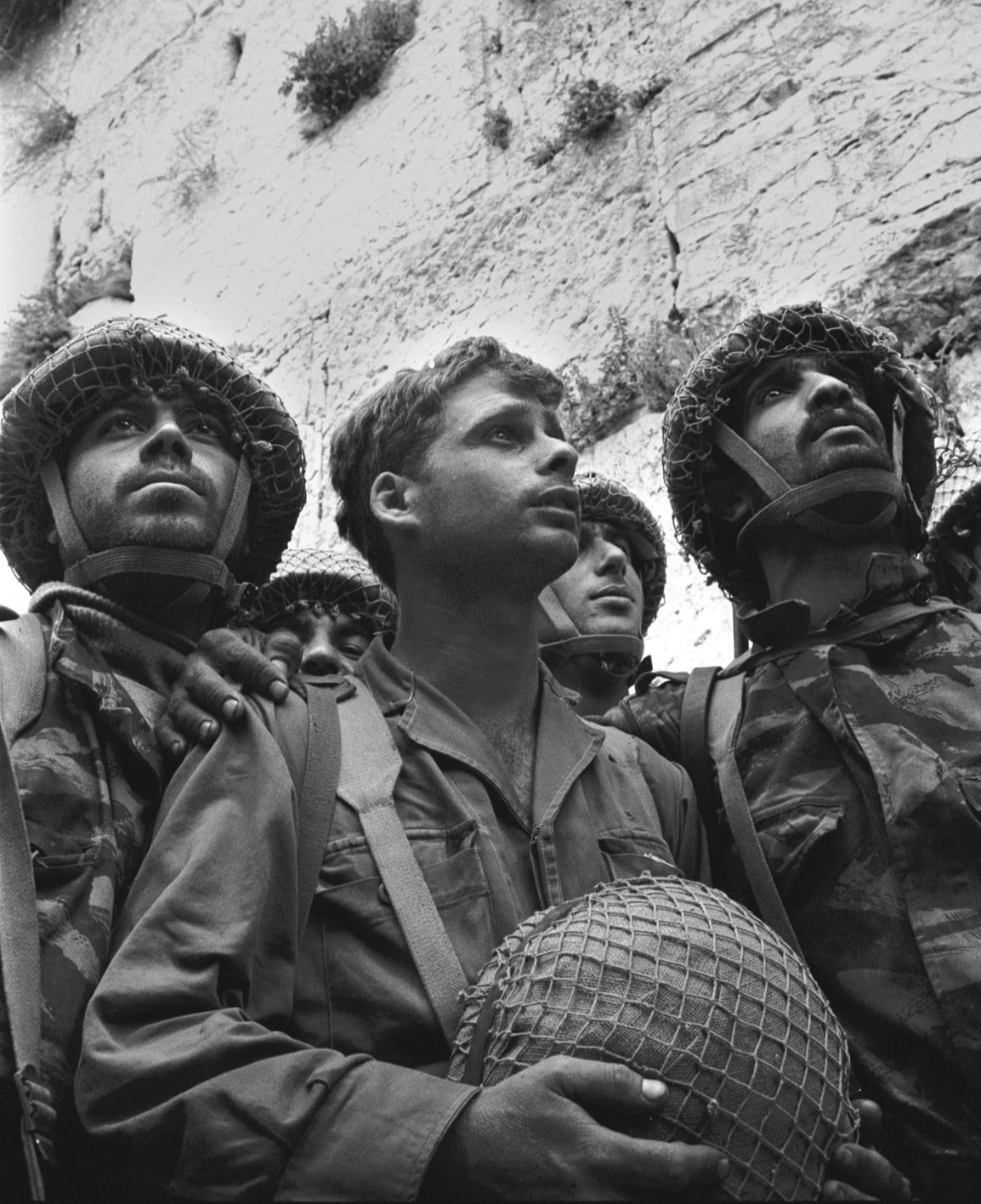 Israeli paratroopers looking at the Western Wall 1967 historic iconic photo, black and white style, high quality