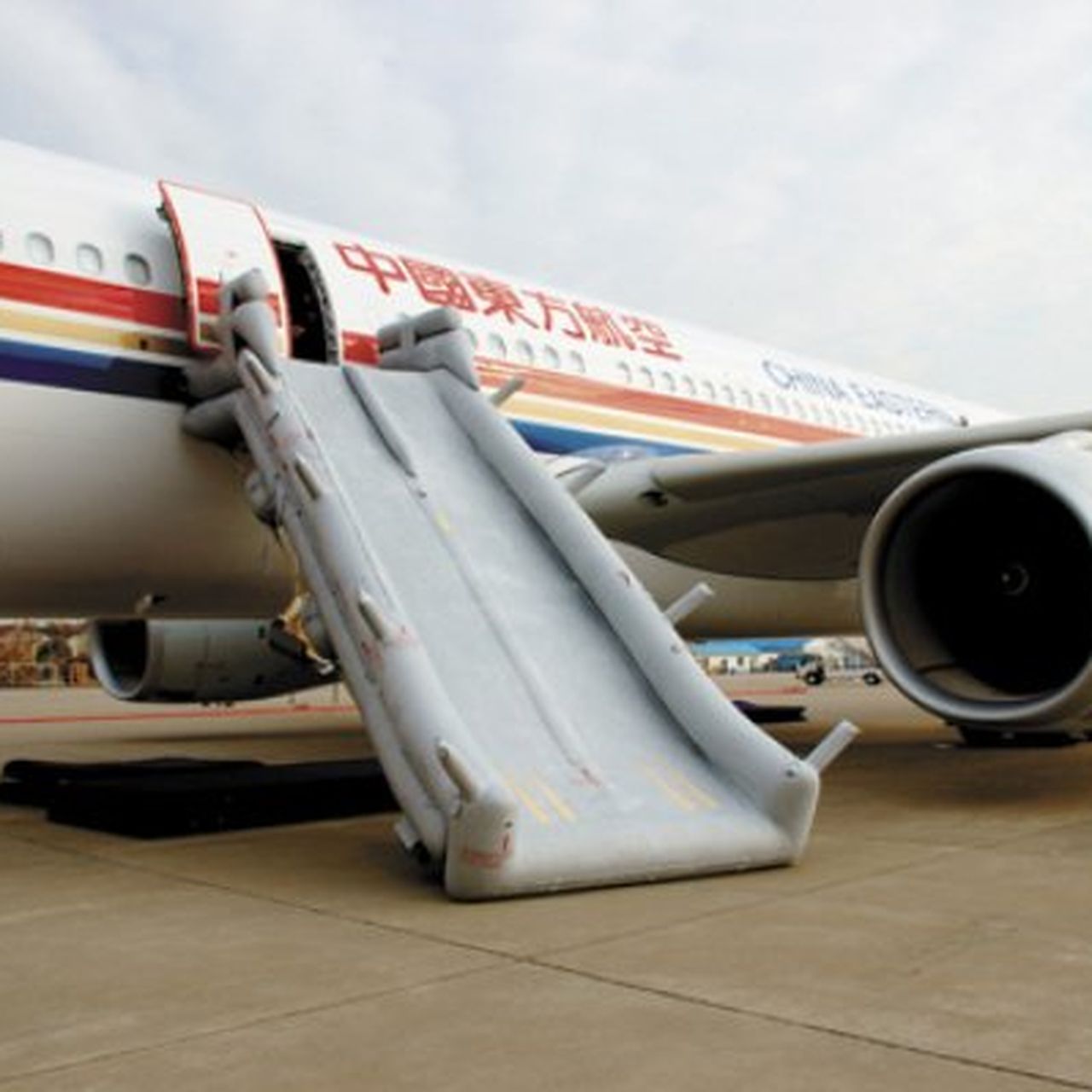 Aircraft emergency evacuation slide deployed, detailed photography