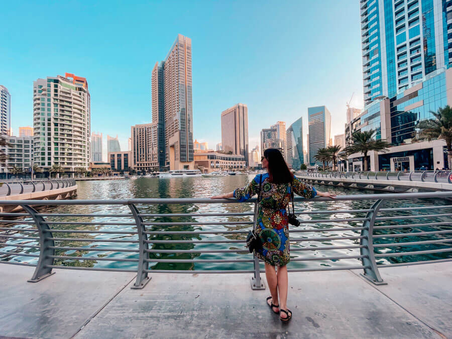 Tourists walking in Dubai Marina or Downtown Dubai, sunny, safe environment
