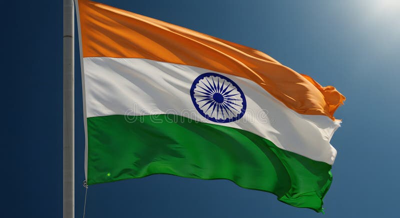 Indian national flag tricolor waving against blue sky