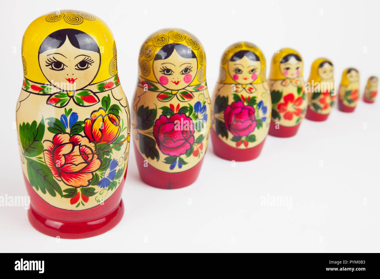 Russian Matryoshka dolls colorful wooden nesting dolls, studio shot