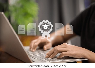 close up of hands typing on a laptop and holding a certificate