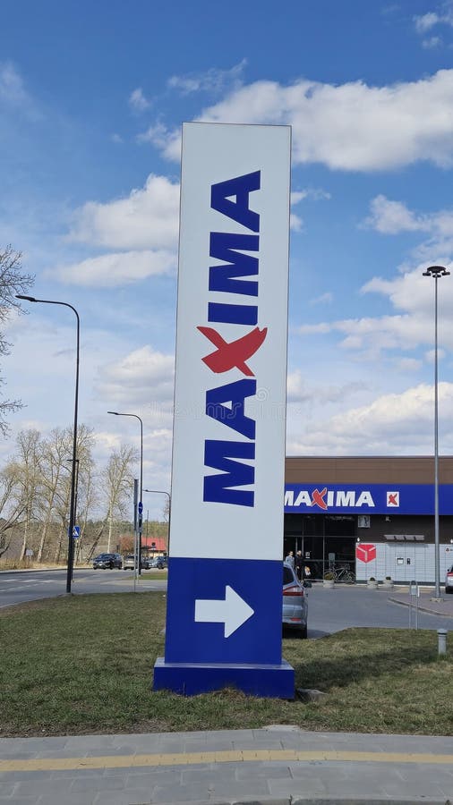 Maxima Lithuania store branding entrance sign